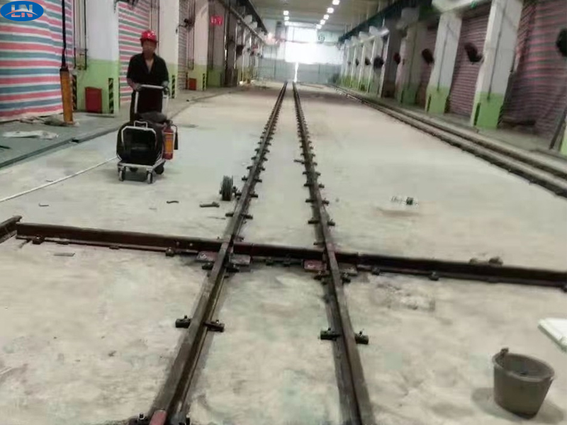 Rail electric transfer cart track pre-embedded processing method